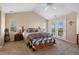 This bedroom offers a private balcony with scenic views at 9928 Bluestar Dr, Parker, CO 80138