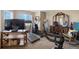 A bonus room is outfitted with fitness equipment at 9928 Bluestar Dr, Parker, CO 80138