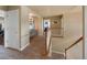 Upstairs hallway boasts a built-in desk and shelving area at 9928 Bluestar Dr, Parker, CO 80138