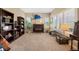 Inviting living room featuring a decorative sailfish on the wall and natural light from the windows at 9928 Bluestar Dr, Parker, CO 80138