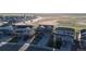 An aerial view of homes with solar panels on the roofs at 6211 Bauer Dr, Frederick, CO 80504