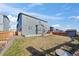 This home has a spacious backyard and wood fence for added privacy at 6211 Bauer Dr, Frederick, CO 80504