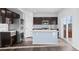 Modern kitchen with stainless steel appliances, center island, and granite countertops at 6211 Bauer Dr, Frederick, CO 80504