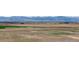 Flat plains stretch to the horizon at 6211 Bauer Dr, Frederick, CO 80504
