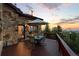 An outdoor deck is perfect for al fresco dining and relaxing while enjoying mountain views at 30717 Conifer Mountain Dr, Conifer, CO 80433