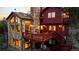 Exterior elevation of a home featuring decks, multi-pane windows, and stone details at 30717 Conifer Mountain Dr, Conifer, CO 80433