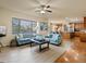 Open living room with bright decor and hardwood floors creates a cozy and inviting atmosphere at 1907 Windemere Ln, Erie, CO 80516