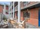 Outdoor patio with modern outdoor seating area at 1 N Pearl St # 102, Denver, CO 80203