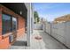Private patio area with brick exterior and gray tile flooring for enjoying outdoor living at 1 N Pearl St # 102, Denver, CO 80203