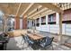 Community patio area with outdoor dining and barbeque grill at 1 N Pearl St # 102, Denver, CO 80203