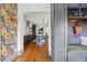 Open-concept kitchen with a large island, modern appliances, and hardwood floors for a seamless cooking and dining experience at 553 S Sherman St, Denver, CO 80209