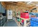 Spacious garage features workbench, tool storage, and ample space for projects and organization at 2146 Savage Rd, Elizabeth, CO 80107