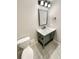 Stylish bathroom featuring a gray vanity with marble countertop and modern fixtures at 20885 Omaha Ave, Parker, CO 80138