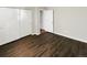 Bedroom features wood floors and a double door closet at 20885 Omaha Ave, Parker, CO 80138