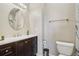Bathroom featuring a vanity with marble countertop and shower at 8199 Welby Rd # 1903, Denver, CO 80229