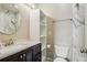 Bathroom with a white countertop sink and walk-in shower at 8199 Welby Rd # 1903, Denver, CO 80229