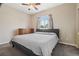 Comfortable bedroom featuring a queen-size bed, neutral decor, and ample natural light at 8199 Welby Rd # 1903, Denver, CO 80229