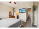 Bedroom featuring a TV on the wall and a closet at 8199 Welby Rd # 1903, Denver, CO 80229