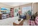 Bright and airy living room with patio access, filled with natural light and offering comfortable seating at 8199 Welby Rd # 1903, Denver, CO 80229