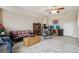 Spacious living room featuring versatile layout options, ideal for work and relaxation at 8199 Welby Rd # 1903, Denver, CO 80229
