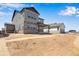 New home with a covered back porch and large backyard space at 24563 E 34Th Ave, Aurora, CO 80019