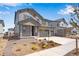 Charming two-story home with a three car garage and stone accents at 24563 E 34Th Ave, Aurora, CO 80019