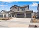 Charming two-story home with a three car garage and beautiful stone accents at 24563 E 34Th Ave, Aurora, CO 80019