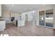 This living space features an open kitchen, eat in area and large windows for lots of light at 24563 E 34Th Ave, Aurora, CO 80019
