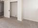 Bedroom with closet and neutral-toned carpet at 219 Terry St, Longmont, CO 80501