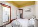 Tranquil bedroom setup with easy access to the laundry area for added convenience at 219 Terry St, Longmont, CO 80501