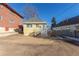 Yellow house with a small front porch and yard at 219 Terry St, Longmont, CO 80501