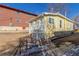 Yellow house exterior with small front porch at 219 Terry St, Longmont, CO 80501