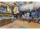 Finished basement with decorations and a billiards table at 1086 Mockingbird St, Brighton, CO 80601