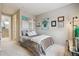 This bedroom features stylish decor and soft carpet, creating a cozy and inviting atmosphere in the home at 3698 Penang Dr, Castle Rock, CO 80109