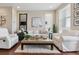 Bright, modern living room features contemporary furniture, hardwood floors, and stylish decor for comfortable living at 3698 Penang Dr, Castle Rock, CO 80109