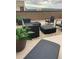 This rooftop deck features contemporary seating and potted plants for a relaxing atmosphere at 3698 Penang Dr, Castle Rock, CO 80109