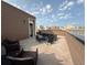 Relaxing rooftop patio featuring modern outdoor furniture, perfect for entertaining or enjoying the views at 3698 Penang Dr, Castle Rock, CO 80109