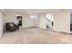 Spacious basement area with neutral carpet, versatile layout and natural light at 1697 W Powers Ave, Littleton, CO 80120