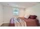 Cozy bedroom with a comfortable bed, soft lighting, and a calming atmosphere at 1697 W Powers Ave, Littleton, CO 80120