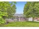 Charming home featuring a well-kept lawn and inviting front entrance at 1697 W Powers Ave, Littleton, CO 80120