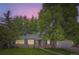 Charming single-story home with mature trees, manicured lawn, and attached garage, with inviting curb appeal at 1697 W Powers Ave, Littleton, CO 80120