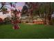 Expansive backyard featuring a lush lawn and a patio area, perfect for outdoor entertaining at 8736 E Easter Ave, Centennial, CO 80112