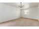 Empty bedroom with carpet, a window, and fresh white paint at 8736 E Easter Ave, Centennial, CO 80112