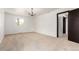 Bright bedroom with plush carpet and natural light from the window at 8736 E Easter Ave, Centennial, CO 80112