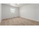 Bedroom with carpet and a window bringing in natural light at 8736 E Easter Ave, Centennial, CO 80112
