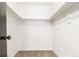 Walk-in closet with shelving and carpeted floor at 8736 E Easter Ave, Centennial, CO 80112