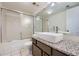 Bathroom with granite countertop and modern vanity at 6702 S Ivy Way # A1, Centennial, CO 80112