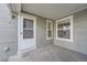 Exterior entryway with private door and window at 6702 S Ivy Way # A1, Centennial, CO 80112