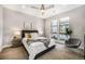 Comfortable main bedroom with ceiling fan and large windows at 5018 S Prince Pl, Littleton, CO 80123