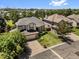 Aerial view of the property showcasing its manicured lawn and its location in a desirable neighborhood at 6449 S Jamaica Cir, Englewood, CO 80111